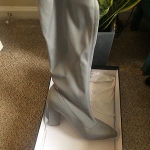 Thigh high neoprene boots